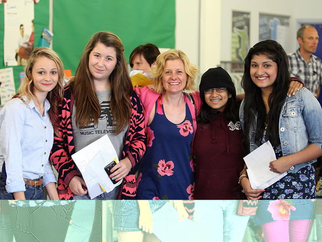 2012 - Students from Northampton School For Girls picking up their GCSE results. (l-r) Sophie Vernon, Chloe Walding, Mrs Skuce, Ash Bipin and Jasmine Patel.