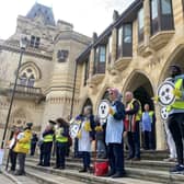 Clean air protesters from 1000 voices took to the steps of the Guildhall before the meeting.