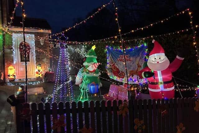 A Northampton family has decorated their home for Christmas in a bid to raise money for causes close to their hearts.