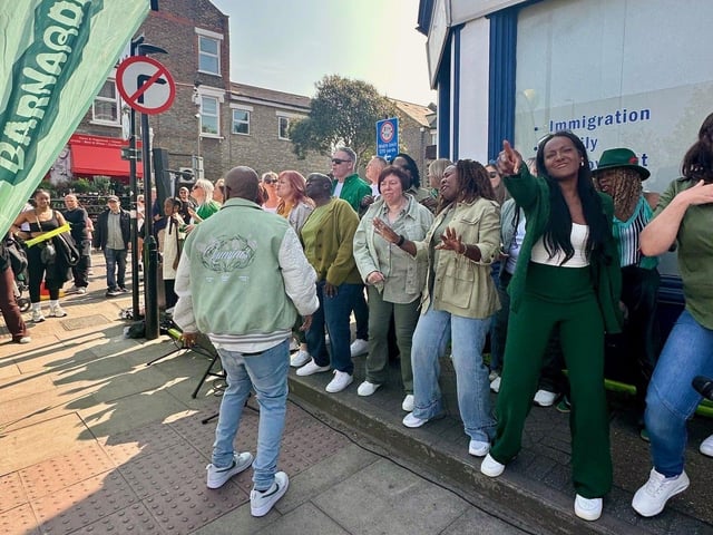 Northants Sings Out perform for runners at the Barnardo's cheer station at the London Marathon