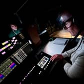 Live production technicians Alex Bass &amp; Tim Halliday sit at their control desk