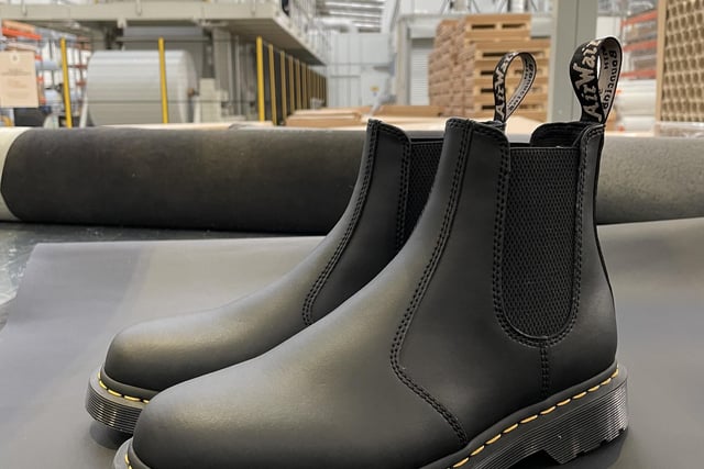 A pair of the new Dr. Martens boots made from sustainable materials created from waste leather by Peterborough-based Gen Phoenix