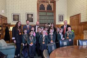 Mike Reader MP, Sir Alan Campbell MP and teachers and students from East Hunsbury Primary School.