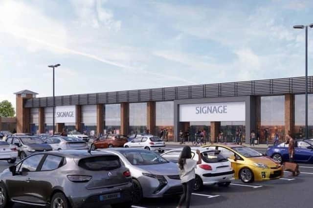 Plans have been submitted to split split the unit into two and give it a makeover. Here's an artist's impression of what the site could look like.