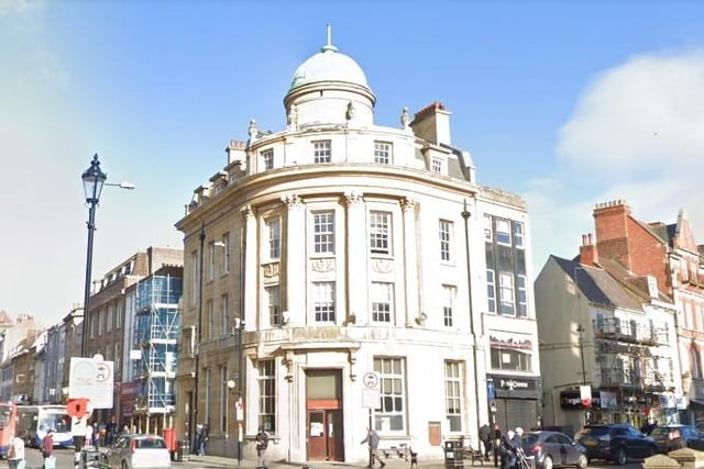 The former Nationwide building in Drapery is part of a collection of structures in that area which offer impressive and historic architecture, although it could do with a lick of paint maybe. The spire is believed to be Grade II listed. The building's ground floor is set to be converted into a gambling venue, while the floors above are used as flats.