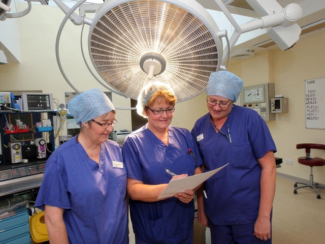 2009 Northampton General Hospital NHS Trust has been named by Patient Safety First as a leading Trust in the campaign to promote patient safety.  NGH is one of 23 organisations to be presented, during Patient Safety First week 21-27 September, with a certificate of recognition for its work in putting patient safety first.  Names l-r: Names l-r: Audrey Browett (theatre manager), Linda Bazeley (modern Matron theatres), Vicky Garrod (Emergency team leader) checking patient safety list.