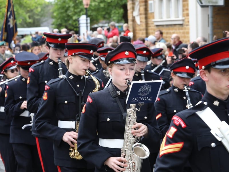 Kettering town centre: crowds line town centre to welcome The Royal Anglian Regiment for Armed Forces Day parade /National World