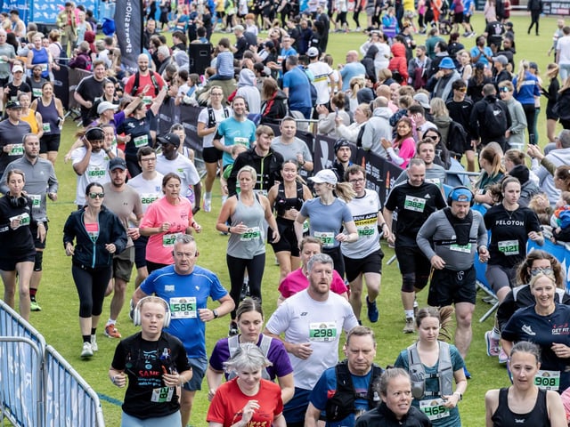 Hundreds of runners braved showers and wind to take on the race on Sunday (May 25), which started and finished at Sixfields stadium.