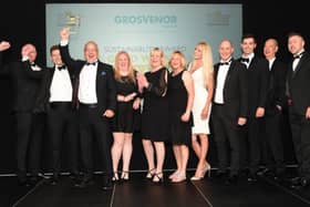 The Cora team celebrating its gold win in the Sustainability category