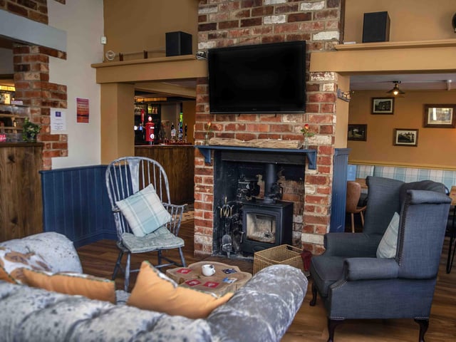 The cosy village pub has recently reopened after a stylish new refurbishment