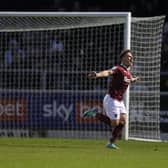 Sam Hoskins celebrates after doubling Northampton's lead against Burton Albion on Saturday.