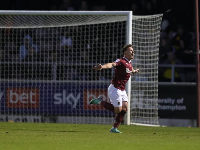 Sam Hoskins celebrates after doubling Northampton's lead against Burton Albion on Saturday.