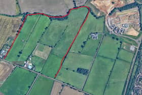 450 homes could be build on the land, within the red boundary, opposite Harpole