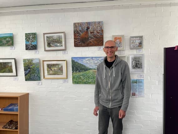 Simon Jones exhibiting his locally-inspired art at Long Buckby Library & Hub for the month of May