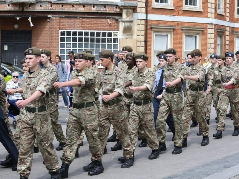 Kettering town centre: crowds line town centre to welcome The Royal Anglian Regiment for Armed Forces Day parade /National World