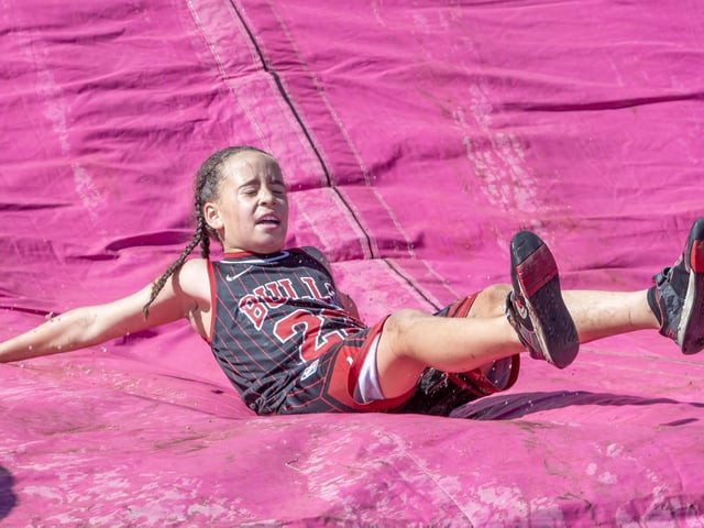 Children were all smiles on Saturday July 12 when they took part in the Race for Life, five kilometre obstacle course in Abington Park, Northampton.