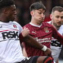 Kieron Bowie battles for posession during the clash wth Charlton Athletic at Sixfields (Picture: Pete Norton)