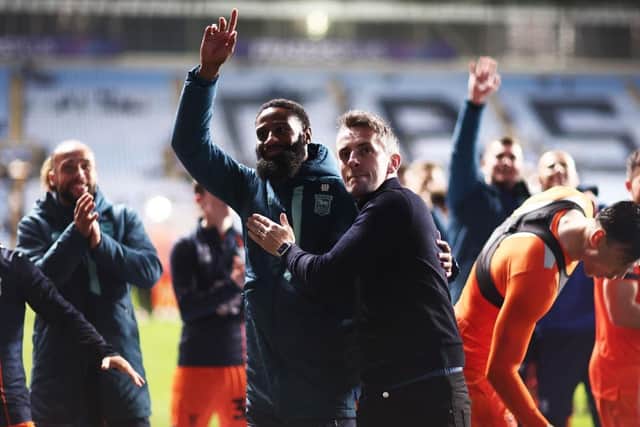 Janoi Donacien of Ipswich Town and Kieran McKenna, Manager of Ipswich Town, show appreciation to the fans at full-time following the team's victory during the Sky Bet Championship match between Coventry City and Ipswich Town at The Coventry Building Society Arena on April 30, 2024 in Coventry, England. (Photo by Naomi Baker/Getty Images) (Photo by Naomi Baker/Getty Images)