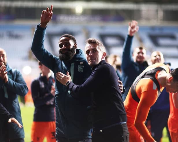Janoi Donacien of Ipswich Town and Kieran McKenna, Manager of Ipswich Town, show appreciation to the fans at full-time following the team's victory during the Sky Bet Championship match between Coventry City and Ipswich Town at The Coventry Building Society Arena on April 30, 2024 in Coventry, England. (Photo by Naomi Baker/Getty Images) (Photo by Naomi Baker/Getty Images)