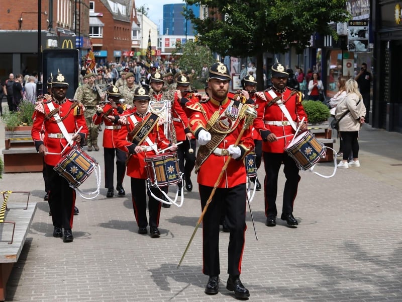 Kettering town centre: crowds line town centre to welcome The Royal Anglian Regiment for Armed Forces Day parade /National World