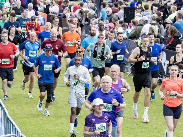 Hundreds of runners braved showers and wind to take on the race on Sunday (May 25), which started and finished at Sixfields stadium.
