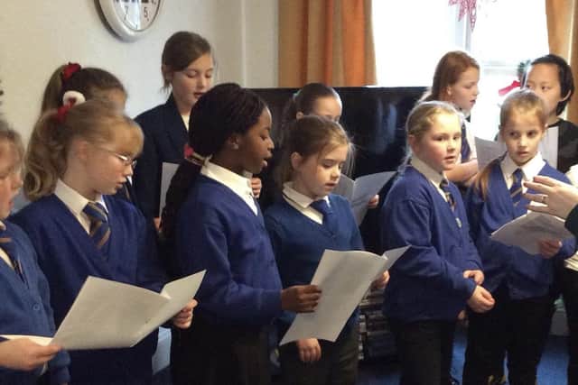 Pupils performing at Rathgar Residential Care Home, which they have been linked with since 2019.