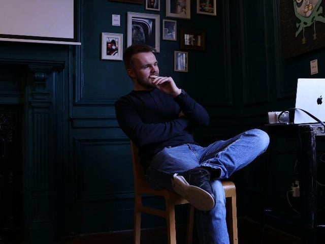 Director of photography watching documentary.