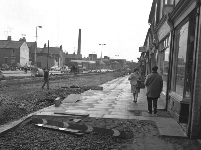 Pavement work at Abington Square, Northampton. St Edmund's Hospital is in the background June 20, 1968