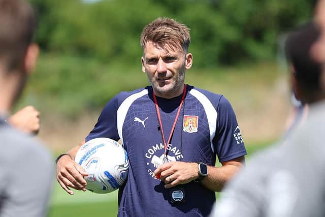 Chris Hogg oversees training on Thursday