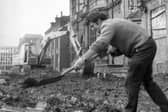 Greyfriars bus station being built in the 1970s, clearing land by shovel