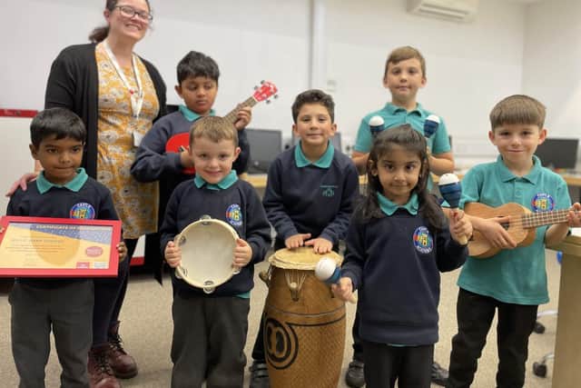 Teacher and music lead Charlie Winter with pupils at Castle Academy