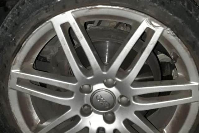 Damaged alloy and punctured tyre for just one motorist