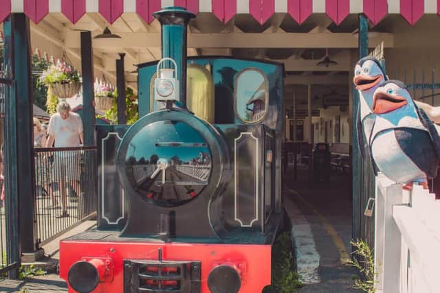 Madagascar penguins with the Wicksteed Park train