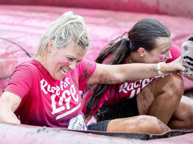 All smiles as participants tackled obstacles during Race for Life's Pretty Muddy on Saturday July 13, 2024 in Abington Park.