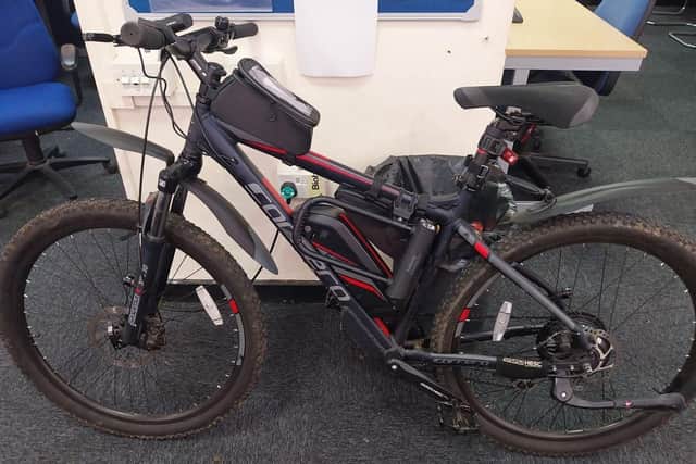Police are appealing for the rightful owner of this electric bike to come forward after it was left outside a Northampton cafe.