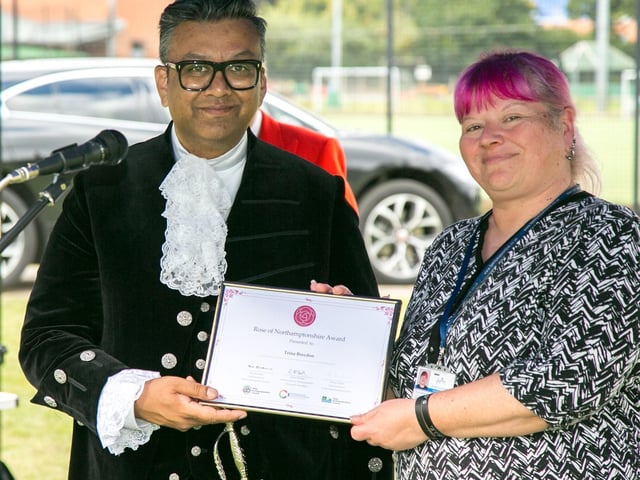 Northamptonshire High Sheriff, Milan Shah MBE, presenting Trina Breedom from Family Support Link with a Rose of Northamptonshire Award. Family Support Link aims to reduce the physical, psychological and emotional harm caused to families and individuals living with or caring for someone who is addicted to drugs and/or alcohol, supporting people across Northamptonshire.