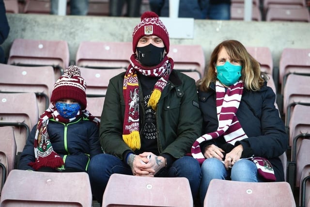 Northampton Town fans return to watch their team for the first game since 07.03.20 due to the coronavirus pandemic during the Sky Bet League One match between Northampton Town and Doncaster Rovers on December 05, 2020