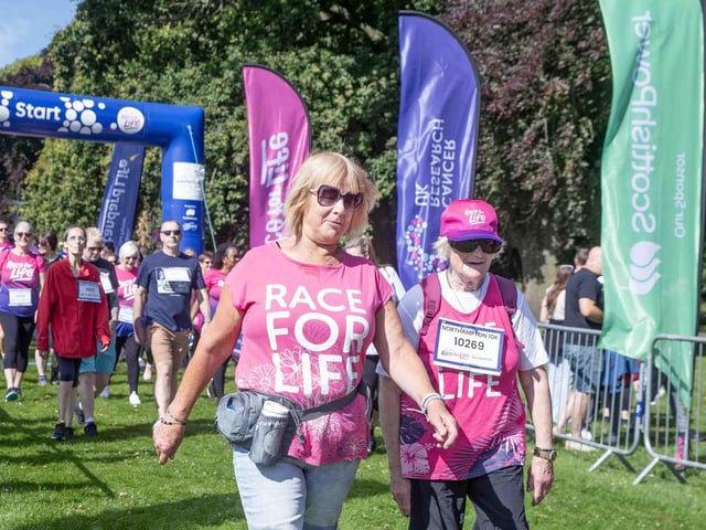Walkers, runners and joggers completed two laps of Abington Park for the 10k Race for Life on Sunday (July 14).