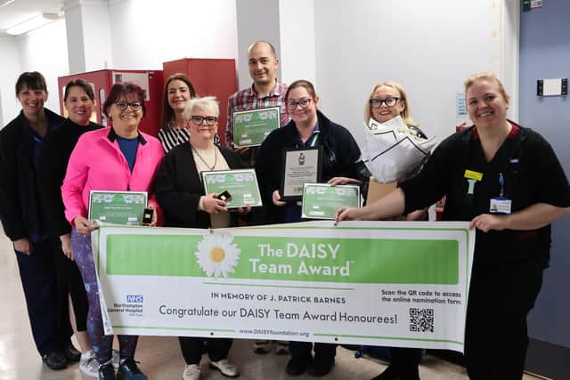 The Night Practitioner Team with their award.