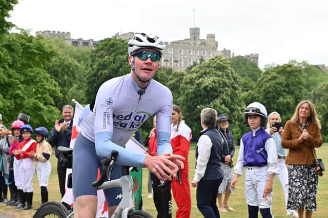 Tom March completes his Pedal3Peaks endurance challenge at the Royal Windsor Horse Show to raise vital funds for Spinal Research in memory of his sister Caroline.