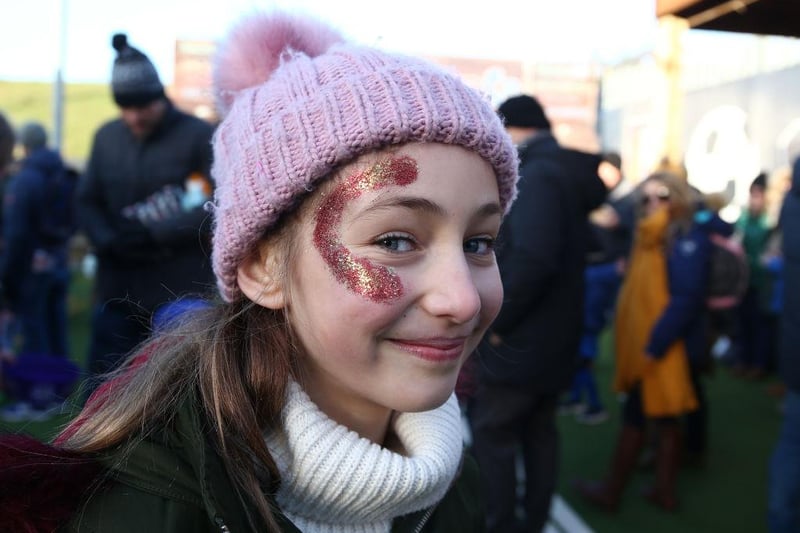 Young Northampton Town fans with painted faces prior to the Sky Bet League Two match between Northampton Town and Forest Green Rovers at PTS Academy Stadium on December 14, 2019.