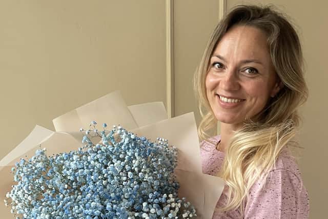 Business owner Ksenija (pictured) has been a florist for the past three years as a hobby alongside her full-time job. After demand from her customers to open a shop, she has now taken it on full-time.