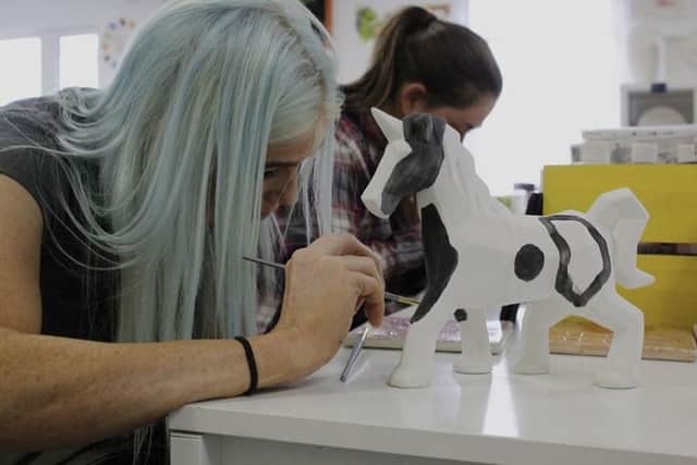 The business, located at Glennons Yard in Billing Garden Village, is a family-friendly environment for people of all ages and abilities with a desire to paint pottery.