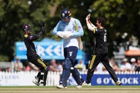 George Bartlett trudges off after being dismissed by Gloucestershire's Oliver Price for 75