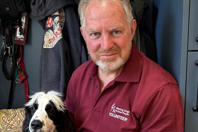 Mark Innes with his Hearing Dogs puppy-in-training Ivan.