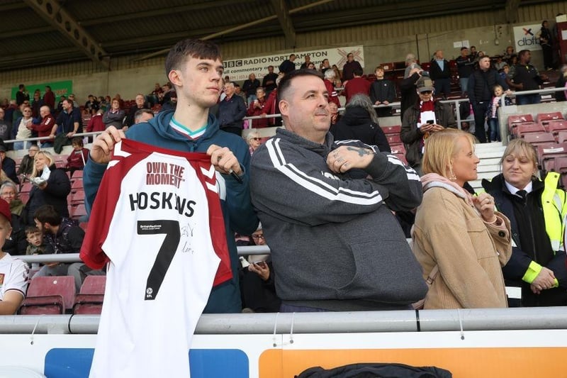 A Northampton Town fan waits to have his shirt signed by Sam Hoskins prior to the Sky Bet League Two between Northampton Town and Salford City at Sixfields on October 08, 2022.