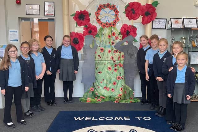 The project was designed around two statues in reception, and the display now takes pride of place in the entrance to Kingsthorpe Grove Primary School for everyone to see following the half term break.