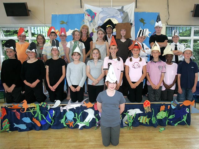 Lynne McMillan, music co-ordinator and Dee Newman, deputy head at Roade Primary School, with pupils in costume for their Ocean Commotion end of year production.