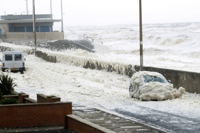It wasn't snowing in this picture at Cleveleys. Gale force winds and high tide in 2008 had caused gallons of froth to come over the sea wall on to the road