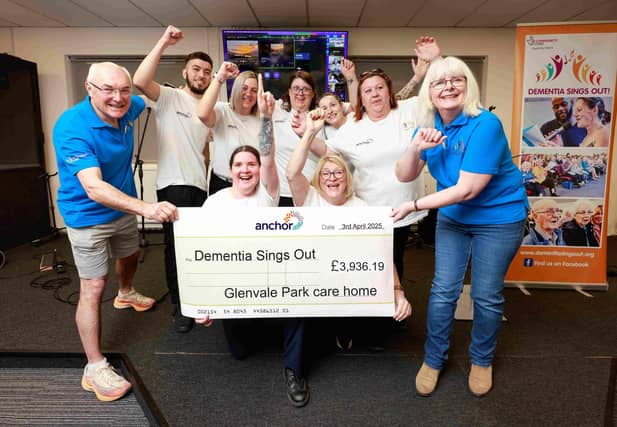 Glenvale Park care colleagues present cheque to Dementia Sings Out